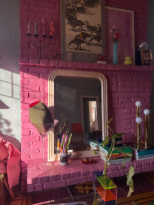Pink fireplace in our heritage home.